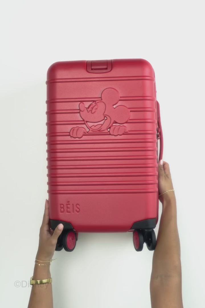 The Disney Small Carry-On Roller  in Mickey Mouse Red